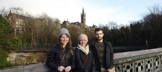 Michelle and friends on a bridge over the River Kelvin with the University of Glasgow in the background